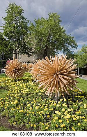 Wooden Sculptures at Place de la Dauversiere in Old Montreal, Quebec, Canada View Large Photo Image Stock Photo - Wooden Sculptures at Place de la Dauversiere in Old Montreal, Quebec, Canada. Fotosearch