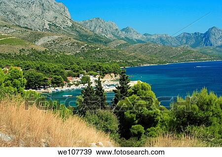 Zivogosce Blato village and Biokovo mountains, Croatia View Large Photo Image Stock Photo - Zivogosce Blato village and Biokovo mountains, Croatia. Fotosearch