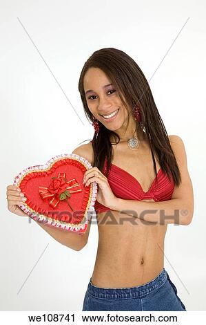 African American woman in early 20's doing glamour modeling for Valentines Day View Large Photo Image Stock Image - African American woman in early 20's doing glamour modeling for Valentines Day. Fotosearch