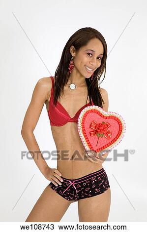 African American woman in early 20's doing glamour modeling for Valentines Day View Large Photo Image Stock Image - African American woman in early 20's doing glamour modeling for Valentines Day. Fotosearch