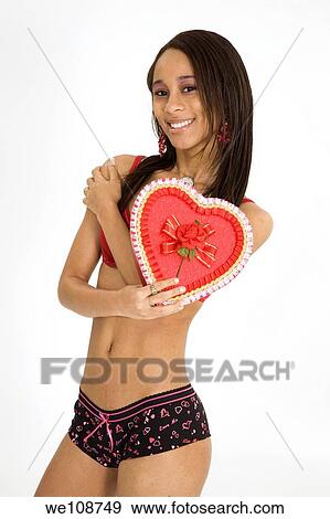 African American woman in early 20's doing glamour modeling for Valentines Day View Large Photo Image Stock Photo - African American woman in early 20's doing glamour modeling for Valentines Day. Fotosearch