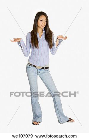 Asian woman showing signs of stress View Large Photo Image Stock Photo - Asian woman showing signs of stress. Fotosearch