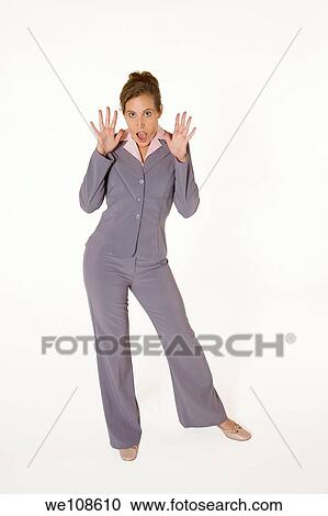 Businesswoman in early 20s standing in a surprised look View Large Photo Image Stock Image - Businesswoman in early 20s standing in a surprised look. Fotosearch