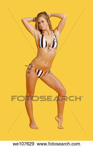 Stock Photo - Caucasian teen in swimsuit. Fotosearch