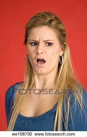 Caucasian woman showing facial expressions in a studio View Large Photo Image Stock Image - Caucasian woman showing facial expressions in a studio. Fotosearch