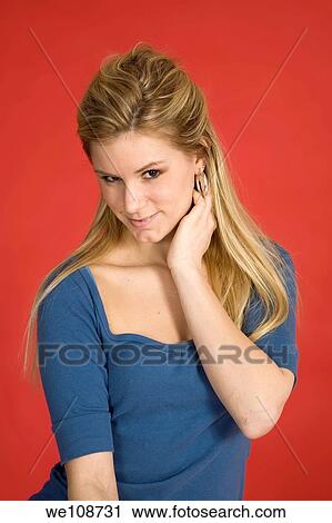 Caucasian woman showing facial expressions in a studio View Large Photo Image Stock Image - Caucasian woman showing facial expressions in a studio. Fotosearch