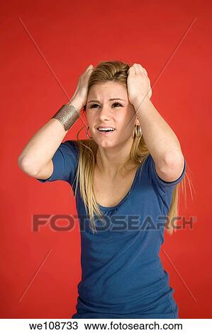 Caucasian woman showing facial expressions in a studio View Large Photo Image Stock Image - Caucasian woman showing facial expressions in a studio. Fotosearch