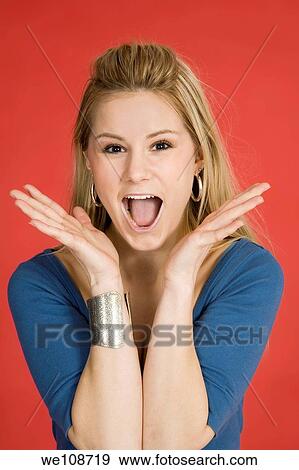 Caucasian woman showing facial expressions in a studio View Large Photo Image Stock Photo - Caucasian woman showing facial expressions in a studio. Fotosearch