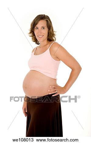 Caucasian woman who is 9 months pregnant on white background View Large Photo Image Stock Image - Caucasian woman who is 9 months pregnant on white background. Fotosearch