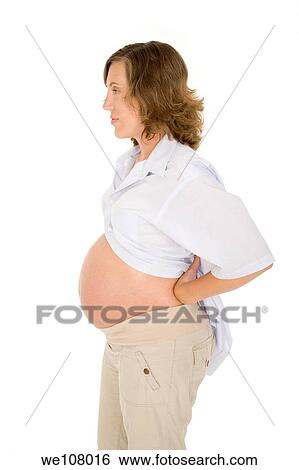 Caucasian woman who is 9 months pregnant on white background View Large Photo Image Stock Photograph - Caucasian woman who is 9 months pregnant on white background. Fotosearch