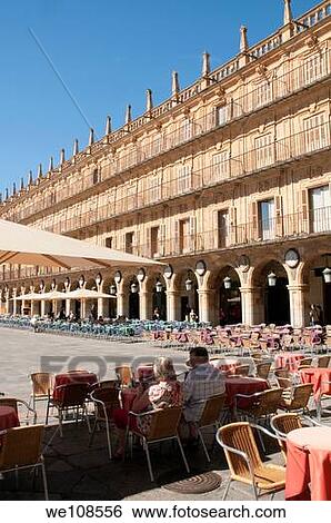 Couple sitting on terrace, Plaza Mayor. Salamanca, Castilla Le? n, Spain. View Large Photo Image Stock Photograph - Couple sitting on terrace, Plaza Mayor. Salamanca, Castilla Le? n, Spain.. Fotosearch