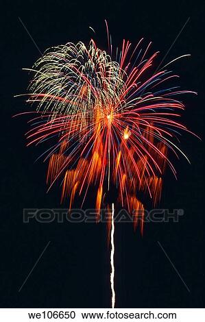 Fireworks light up the night time sky View Large Photo Image Stock Image - Fireworks light up the night time sky. Fotosearch