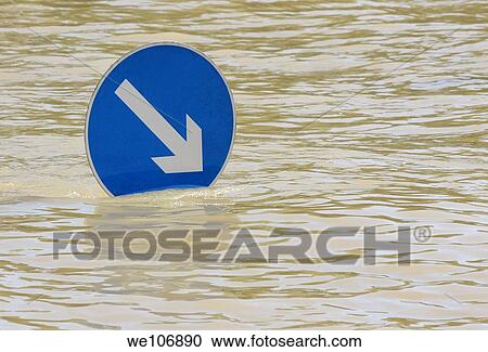 Flowing river and mandatory traffic sign indicating the direction of travel. View Large Photo Image Stock Image - Flowing river and mandatory traffic sign indicating the direction of travel.. Fotosearch
