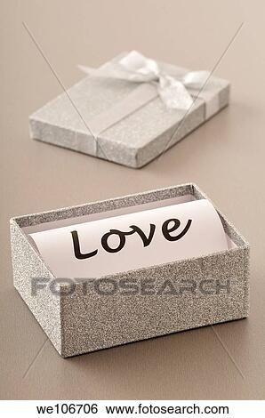 Love in letters in a box View Large Photo Image Stock Photograph - Love in letters in a box. Fotosearch