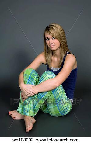 Model Release 381 Teenage girl posing on gray background View Large Photo Image Stock Image - Model Release 381 Teenage girl posing on gray background. Fotosearch