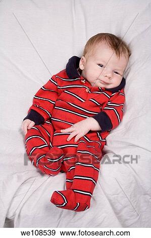 New born baby boy in first photo shoot View Large Photo Image Stock Photo - New born baby boy in first photo shoot. Fotosearch