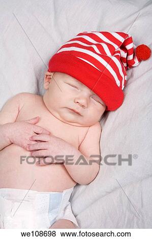 New born baby boy in first photo shoot View Large Photo Image Stock Photo - New born baby boy in first photo shoot. Fotosearch
