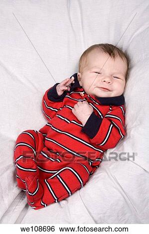 New born baby boy in first photo shoot View Large Photo Image Stock Photograph - New born baby boy in first photo shoot. Fotosearch