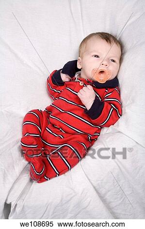 New born baby boy in first photo shoot View Large Photo Image Stock Photography - New born baby boy in first photo shoot. Fotosearch
