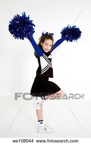 Nine year old girl dressed as cheerleader View Large Photo Image Picture - Nine year old girl dressed as cheerleader. Fotosearch