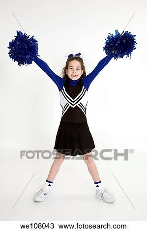 Nine year old girl dressed as cheerleader View Large Photo Image Stock Image - Nine year old girl dressed as cheerleader. Fotosearch