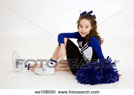 Nine year old girl dressed as cheerleader View Large Photo Image Stock Image - Nine year old girl dressed as cheerleader. Fotosearch