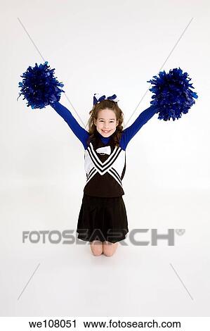 Nine year old girl dressed as cheerleader View Large Photo Image Stock Image - Nine year old girl dressed as cheerleader. Fotosearch