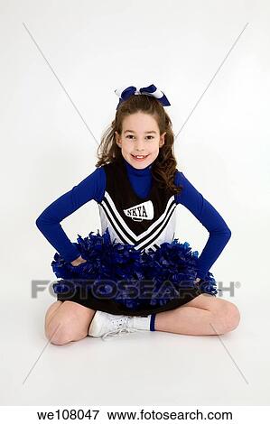 Nine year old girl dressed as cheerleader View Large Photo Image Stock Photo - Nine year old girl dressed as cheerleader. Fotosearch