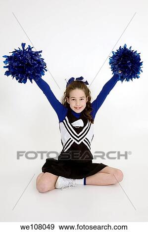 Nine year old girl dressed as cheerleader View Large Photo Image Stock Photo - Nine year old girl dressed as cheerleader. Fotosearch