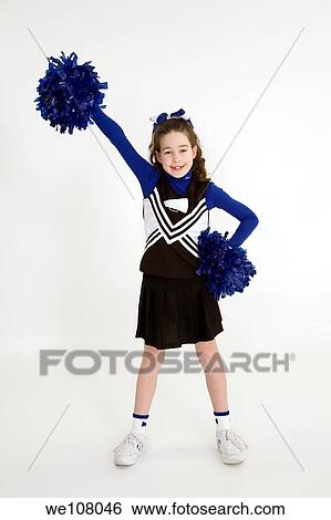 Nine year old girl dressed as cheerleader View Large Photo Image Stock Photograph - Nine year old girl dressed as cheerleader. Fotosearch