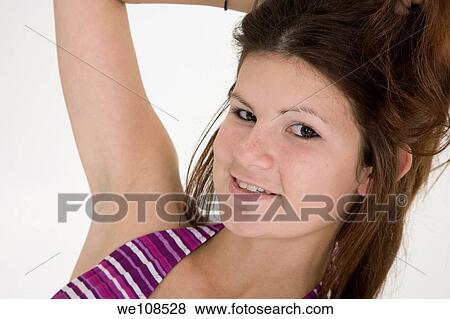 Portrait of a teenage girl in a swimsuit top View Large Photo Image Stock Photo - Portrait of a teenage girl in a swimsuit top. Fotosearch