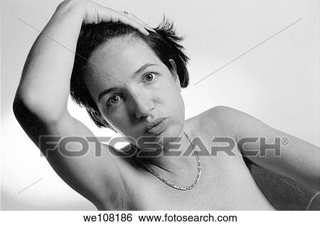 Portrait of a young woman looking stressed View Large Photo Image Stock Photograph - Portrait of a young woman looking stressed. Fotosearch