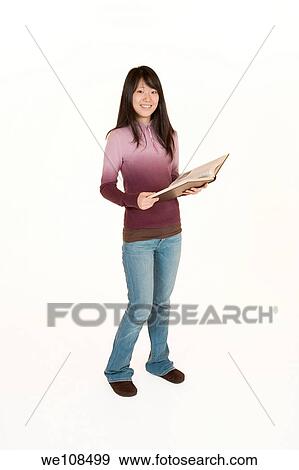 Portrait of Asian teen getting ready for school View Large Photo Image Stock Photo - Portrait of Asian teen getting ready for school. Fotosearch