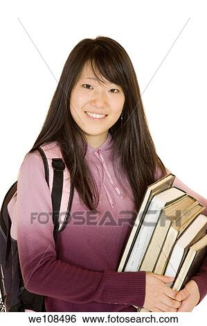 Stock Photograph - Portrait of Asian teen getting ready for school. Fotosearch