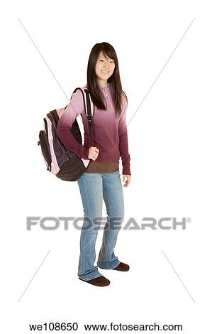 Stock Image - Portrait of Asian tenn getting ready for school. Fotosearch