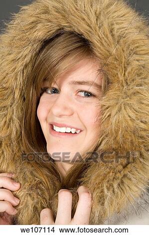 Preteen girl posing on gray background with some attitude View Large Photo Image Picture - Preteen girl posing on gray background with some attitude. Fotosearch