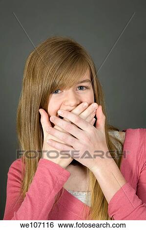 Preteen girl posing on gray background with some attitude View Large Photo Image Stock Photograph - Preteen girl posing on gray background with some attitude. Fotosearch