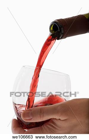 Red Wine pouring into glass View Large Photo Image Stock Image - Red Wine pouring into glass. Fotosearch