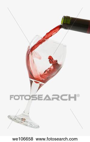 Red Wine pouring into glass View Large Photo Image Stock Photo - Red Wine pouring into glass. Fotosearch