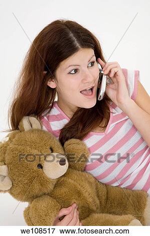 Teen talking on the cell phone View Large Photo Image Stock Photo - Teen talking on the cell phone. Fotosearch