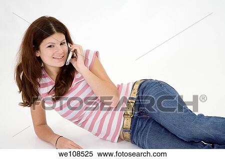 Teen talking on the cell phone View Large Photo Image Stock Photography - Teen talking on the cell phone. Fotosearch