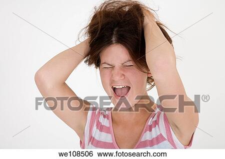 Stock Photograph - Teenage girl angry. Fotosearch