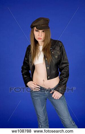 Teenage girl displaying an attitude View Large Photo Image Stock Photo - Teenage girl displaying an attitude. Fotosearch