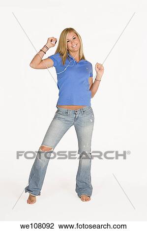 Teenage girl listening to music View Large Photo Image Stock Image - Teenage girl listening to music. Fotosearch