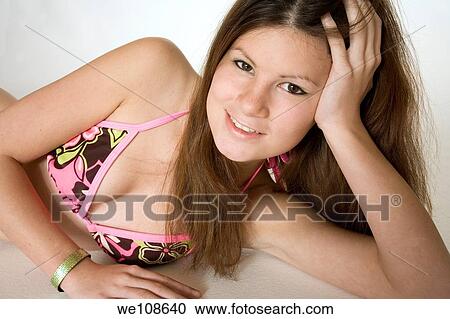 Teenage girl modeling swimsuit View Large Photo Image Stock Image - Teenage girl modeling swimsuit. Fotosearch