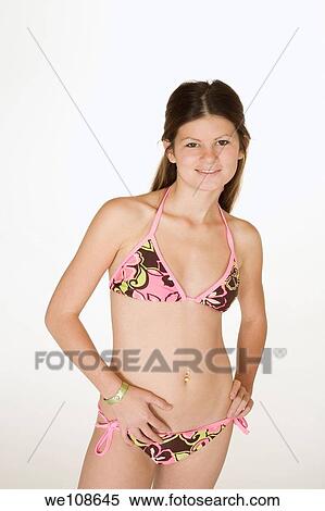 Teenage girl modeling swimsuit View Large Photo Image Stock Photography - Teenage girl modeling swimsuit. Fotosearch