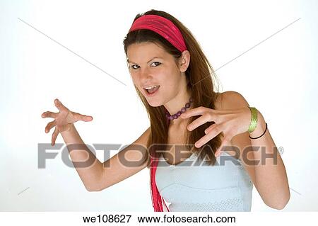 Teenage girl posing on a white background View Large Photo Image Stock Photo - Teenage girl posing on a white background. Fotosearch