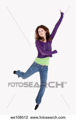 Teenage girl who is jumping very excited View Large Photo Image Stock Image - Teenage girl who is jumping very excited. Fotosearch