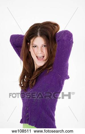 Stock Image - Teenage girl who is very excited. Fotosearch