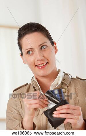 Woman in a clothes shop View Large Photo Image Stock Photography - Woman in a clothes shop. Fotosearch